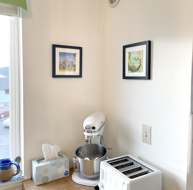 Photo of art by David Oliver hanging on wall